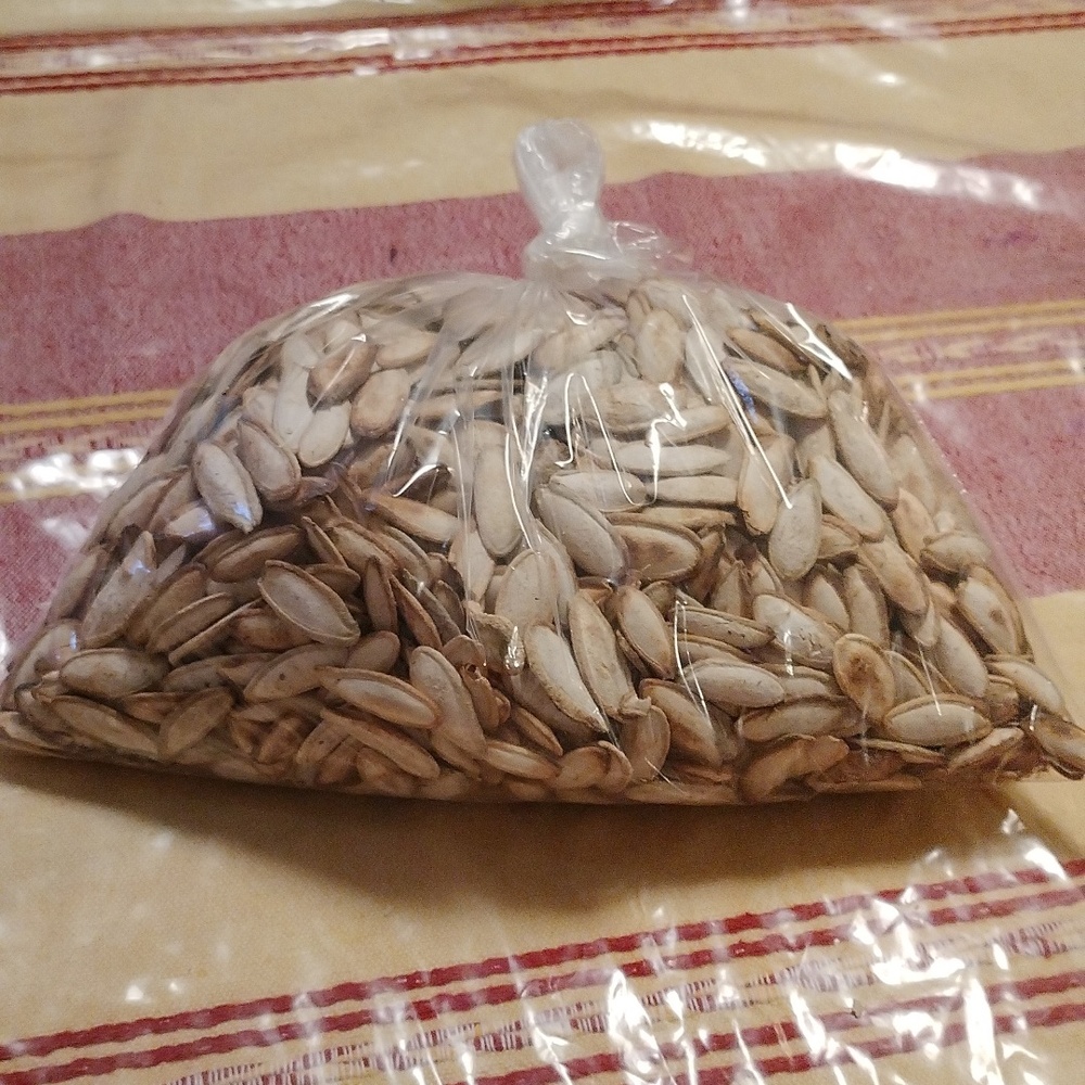 a pound of pumpkin seeds, it's roasted with salt ready to eat.